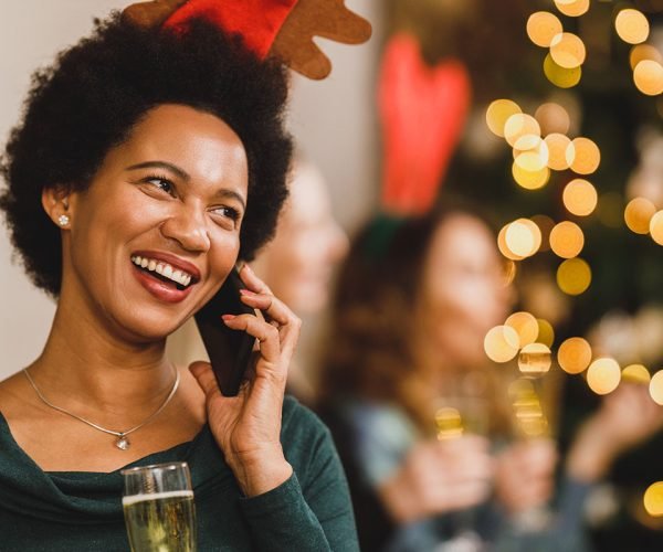african-american-woman-using-smart-phone-at-a-chri-VBKSJLB.jpg